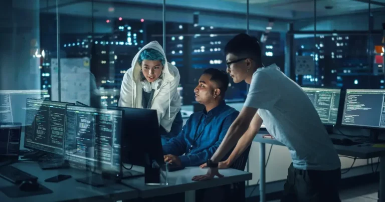 people working on office looking at computer
