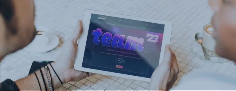 man-holding-tablet-with-atlassian-team23-screen-on-it
