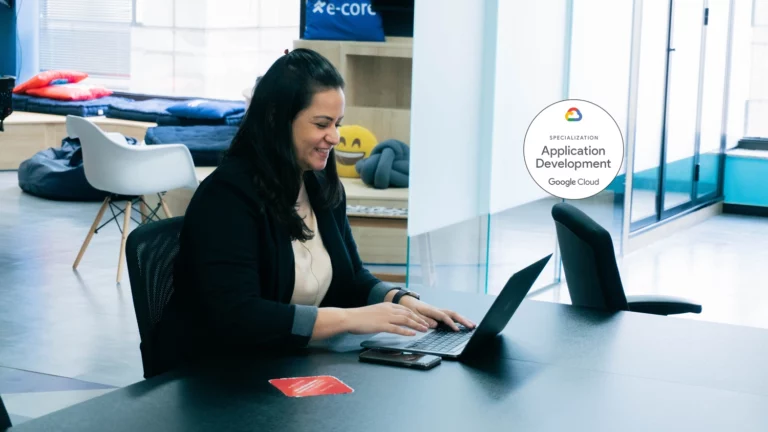 woman-working-on-e-Core's-office-with-application-development-badge-floating-beside-her